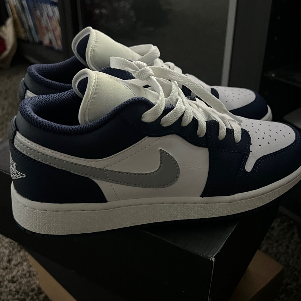 Jordan 1 Low-Top Sneakers in Navy, White, and Silver
